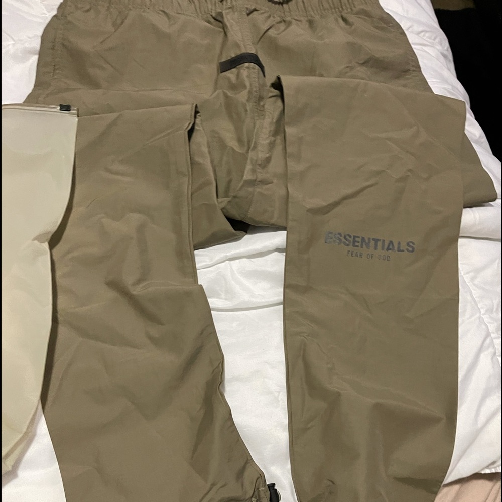 Essential track pants. Wind breaker material